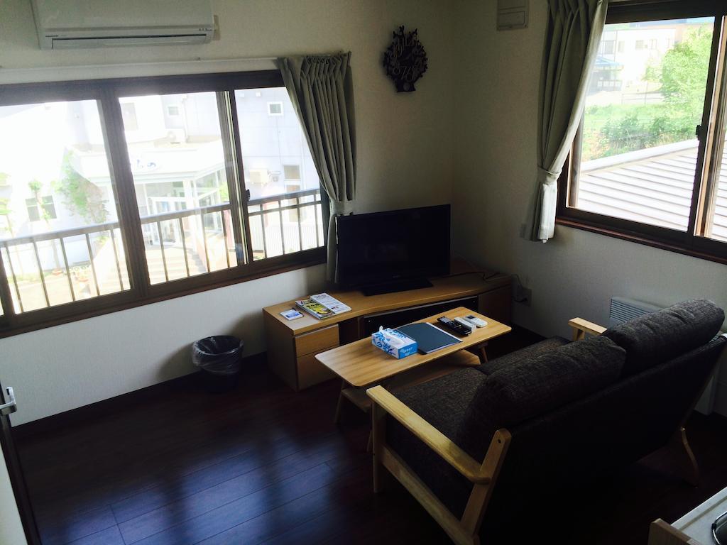 Вилла Kashiwa House Фурано Номер фото